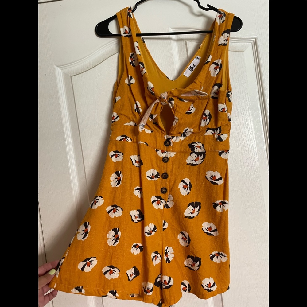 Yellow floral romper size M